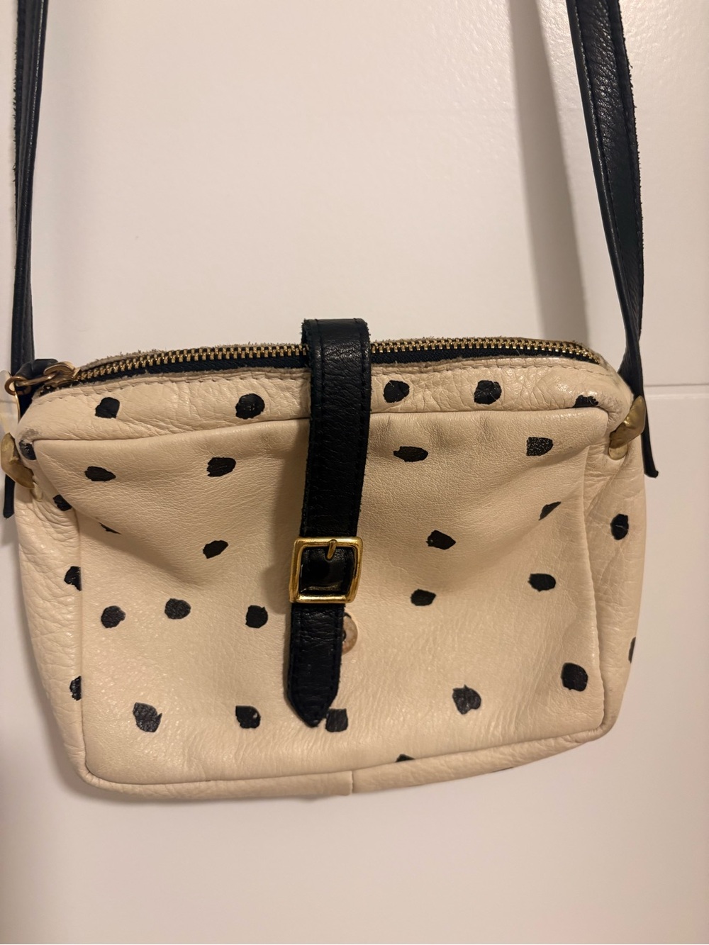Cream Polka Dot Crossbody Bag with Black Strap and Buckle